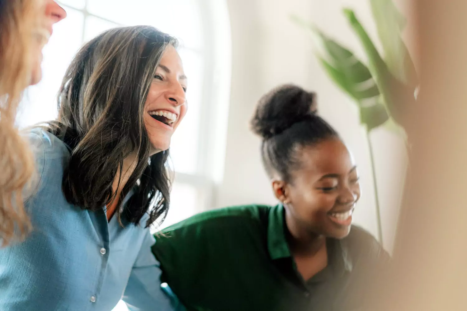 a pastor's wife laughing with women in her church