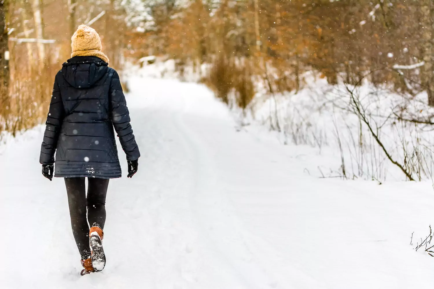 A pastor's wife walks in the snow during advent.